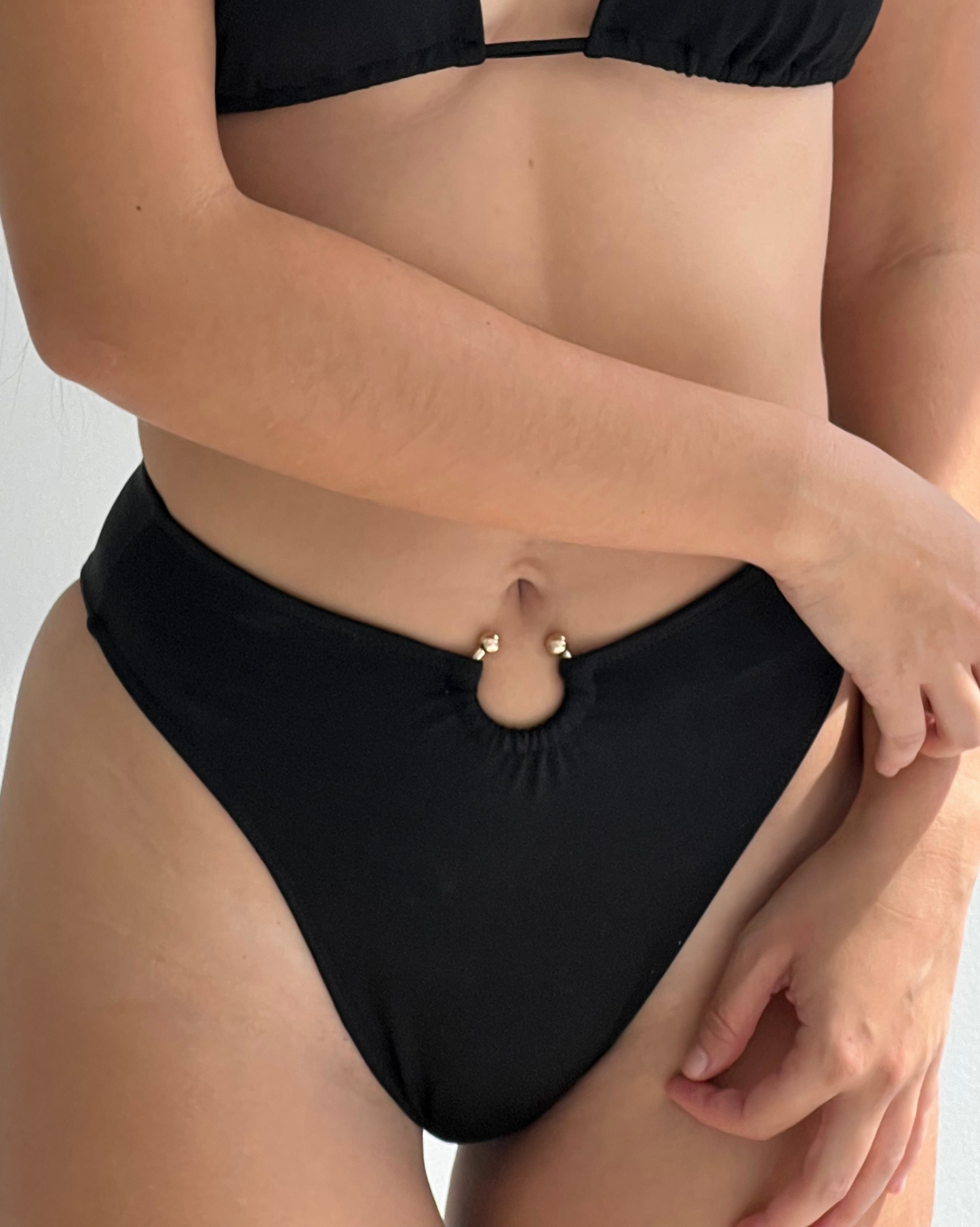 Black bikini bottom with golden ring